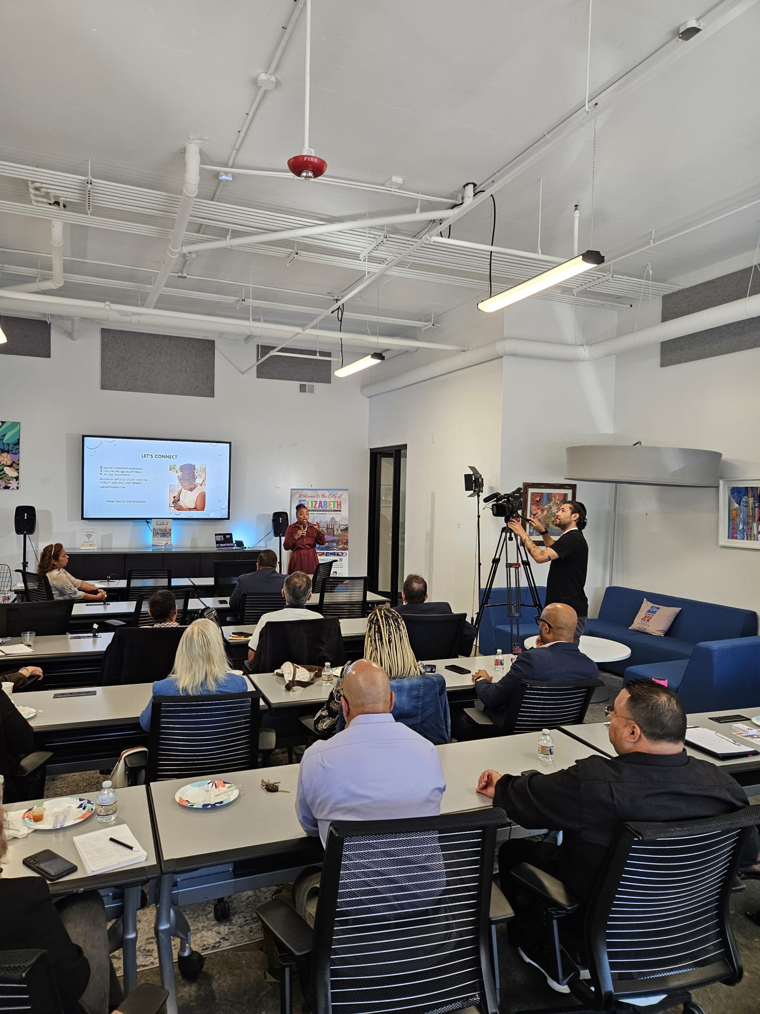 Aikilah Thompkins-Robinson speaking about using AI in your small new jersey business at Vintage City in Elizabeth NJ, with the Greater Elizabeth Chamber of Commerce and UCNJ